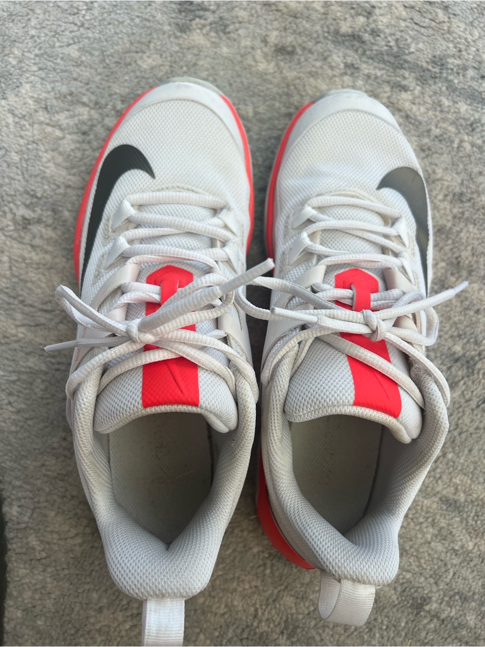 Nike White tennis Sneakers with neon Accents and Black Swoosh